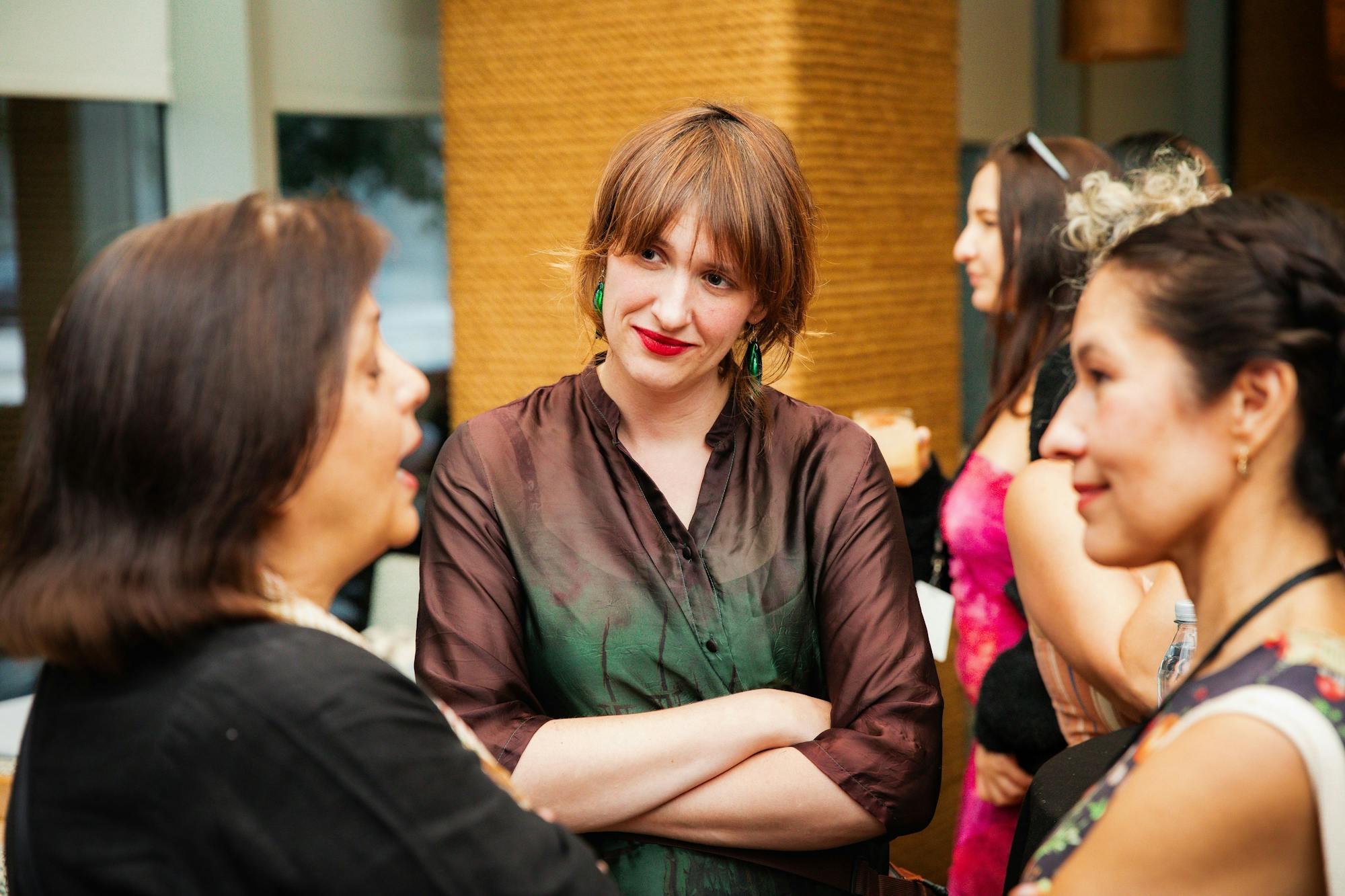 With attendees after a talk