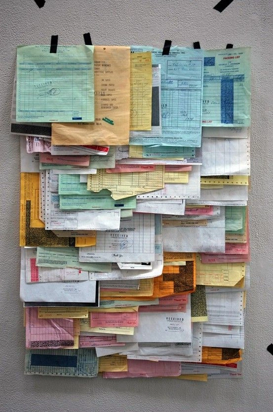 A wall of pinned receipts and dockets